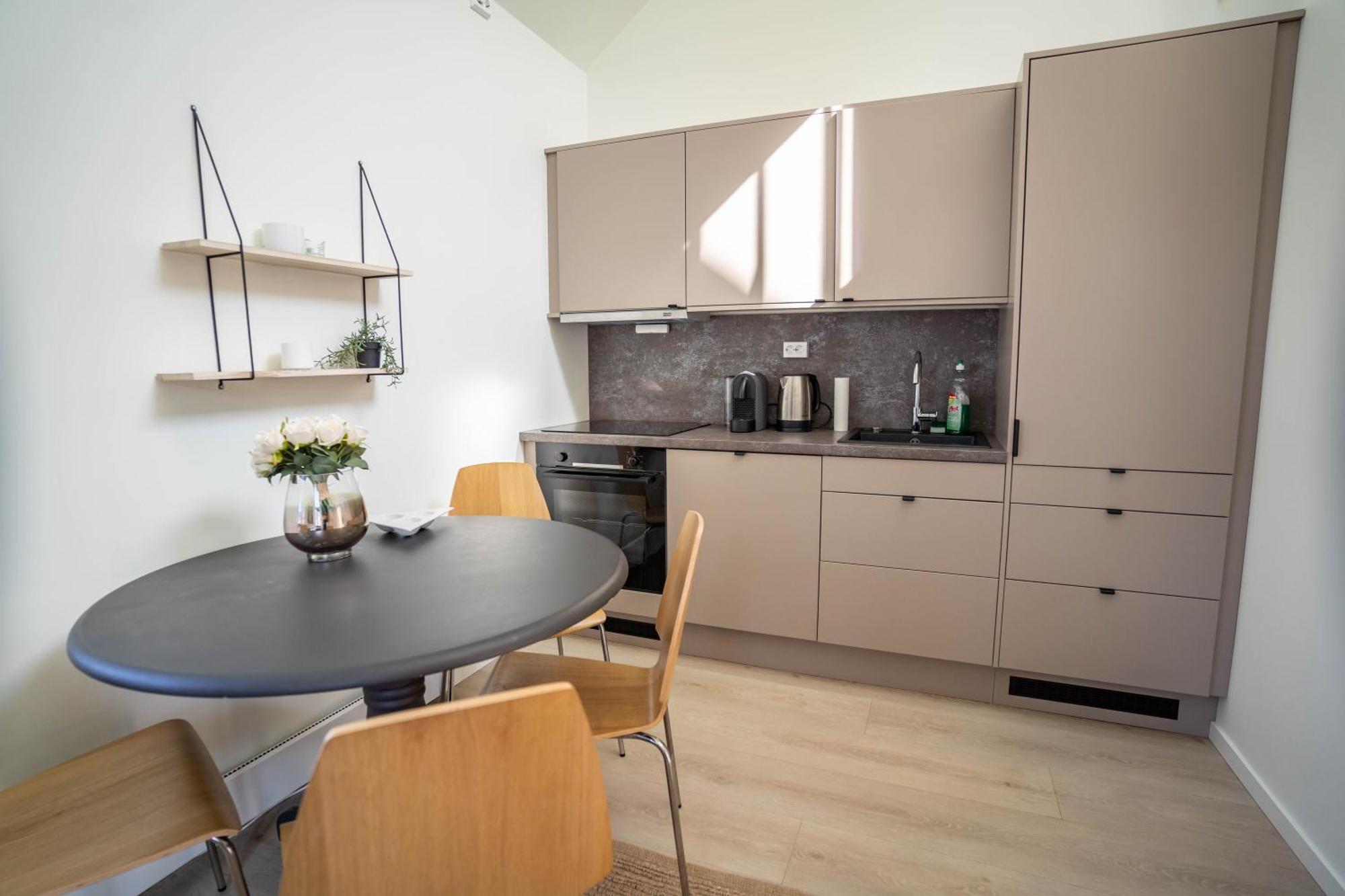 Vibrant On Bustling Street, Above A Restaurant Perfect For Tourists,