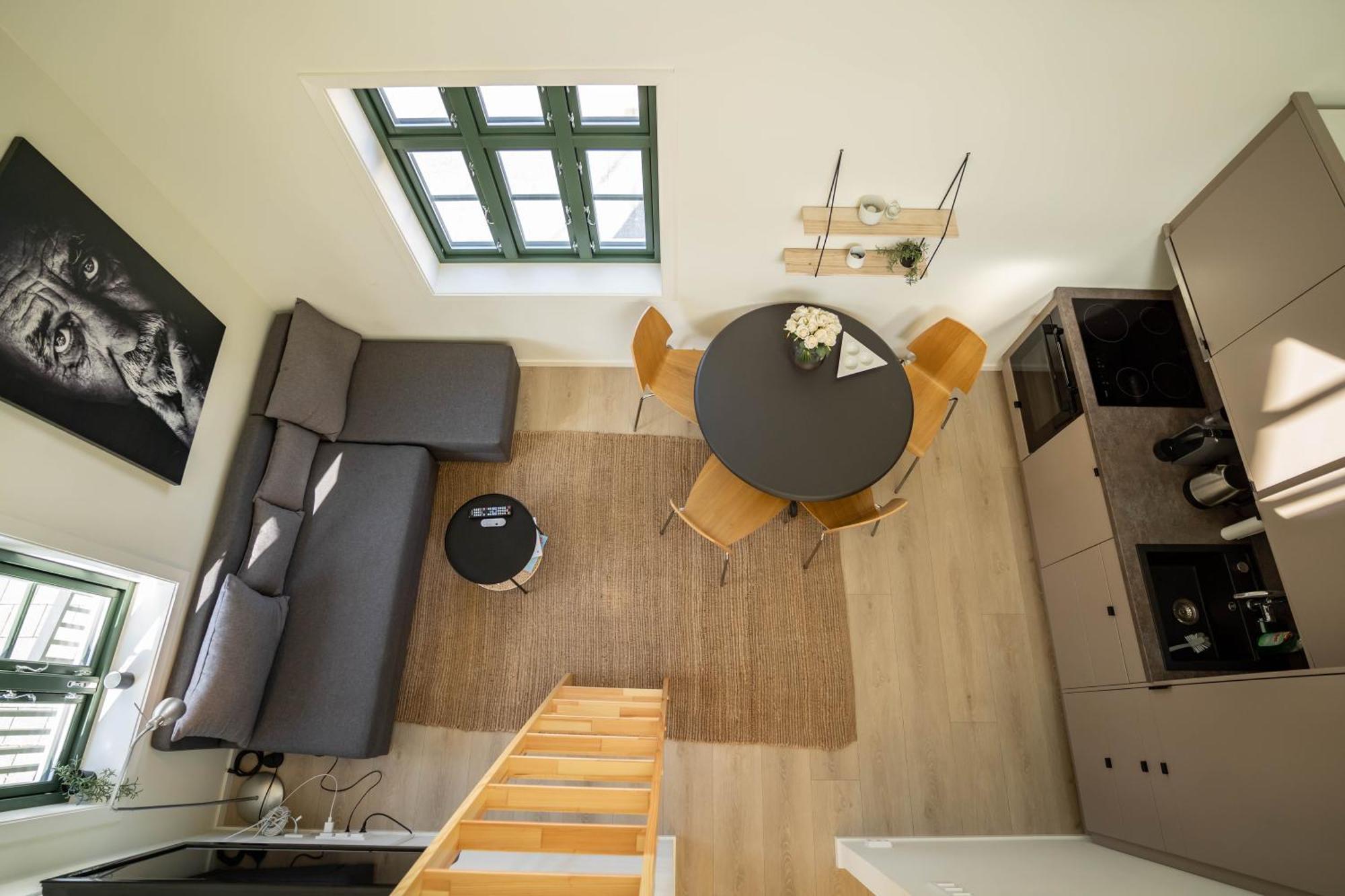 Vibrant On Bustling Street, Above A Restaurant Perfect For Tourists,